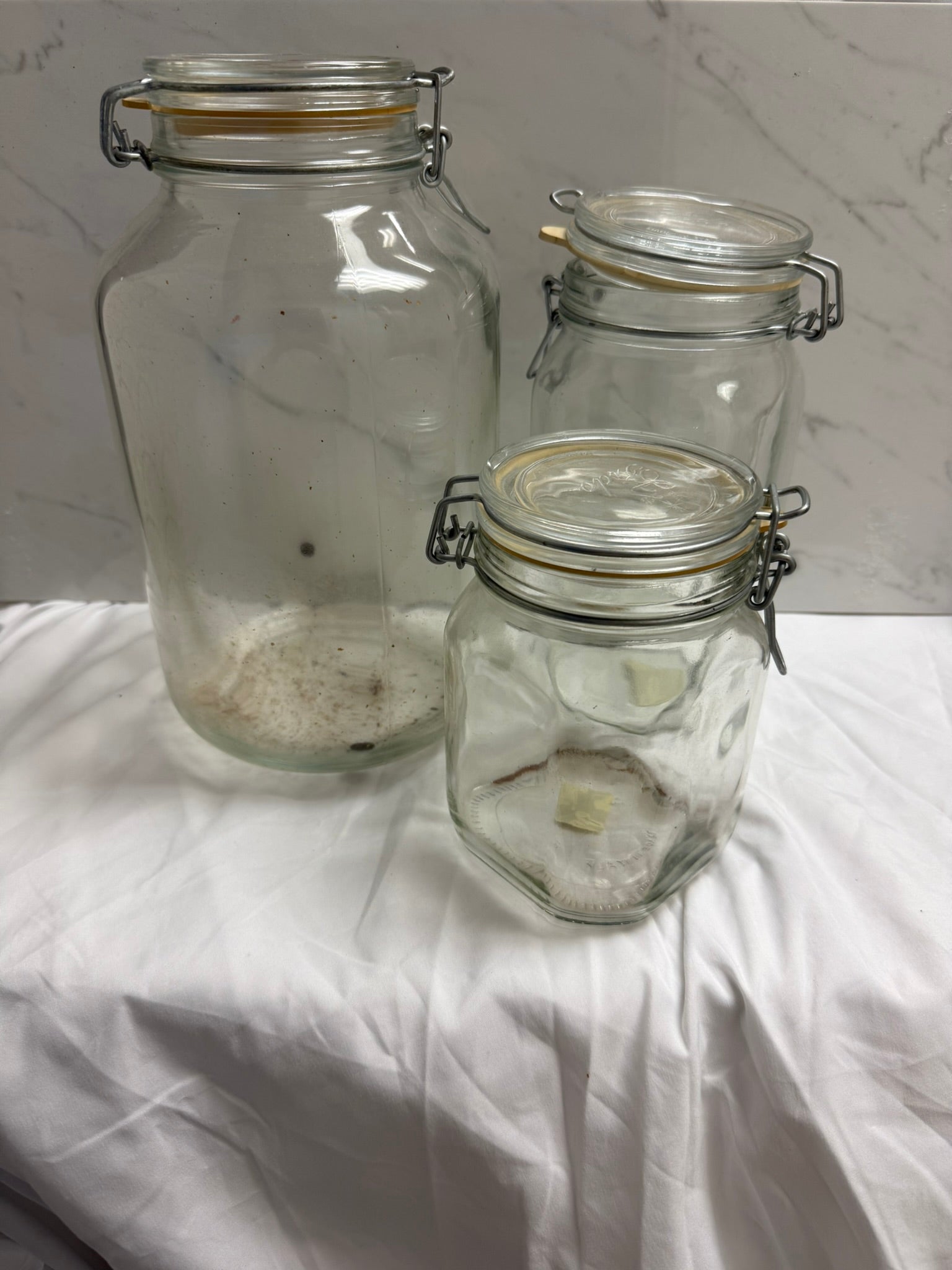 GLASS STORAGE JAR WITH CLAMTOP SET OF 3