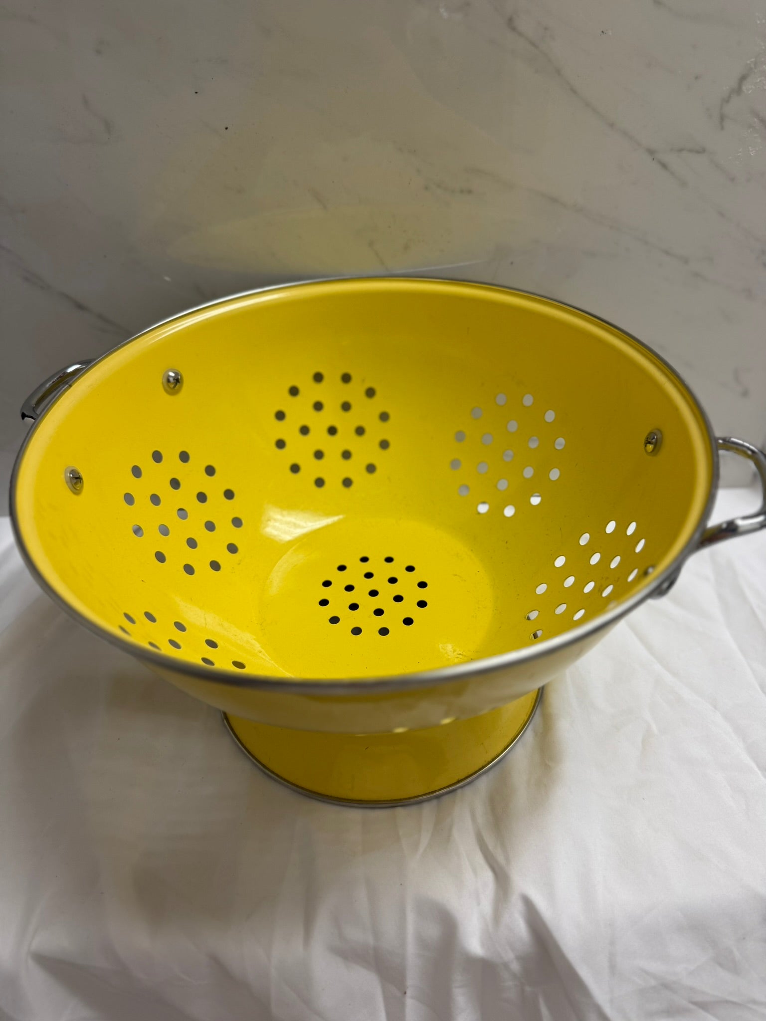 YELLOW METAL COLANDER