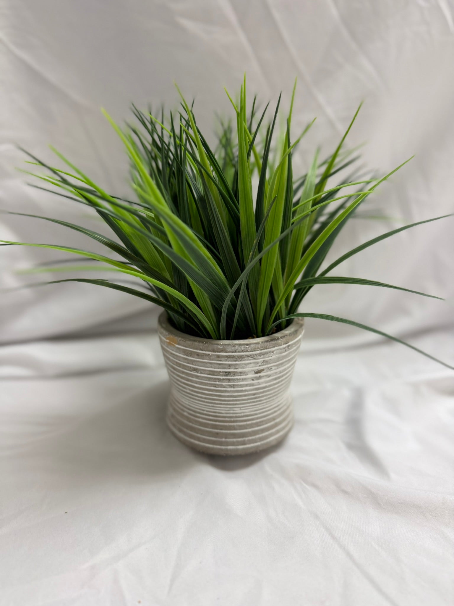 FAUX PLANT IN STRIPED POT