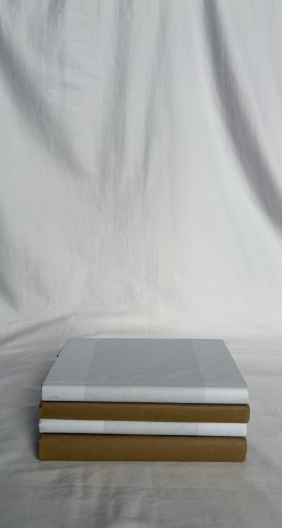 WHITE AND BROWN WRAPPED BOOKS